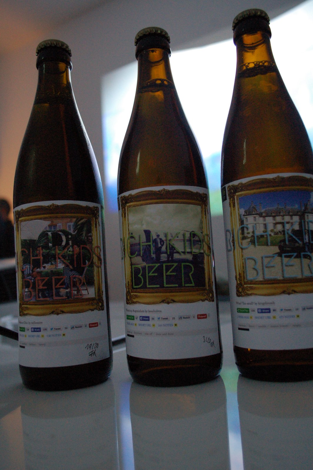 Three bottles in daylight, labels facing out